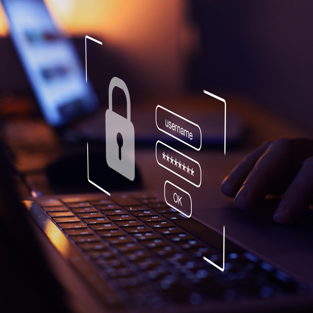 Login-Maske mit Schloss auf Laptop-Tastatur – Symbol für digitale Sicherheit und Datenschutz.
